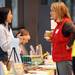 Faye Ogaswara of Slow Food Huron Valley and Carole Durgy of Project Health Schools/UMHS chat during the Homegrown Local Food Summit in the atrium at the Morris J. Lawrence Building at Washtenaw Community College on Friday, Feb. 22, 2013. Melanie Maxwell I AnnArbor.com